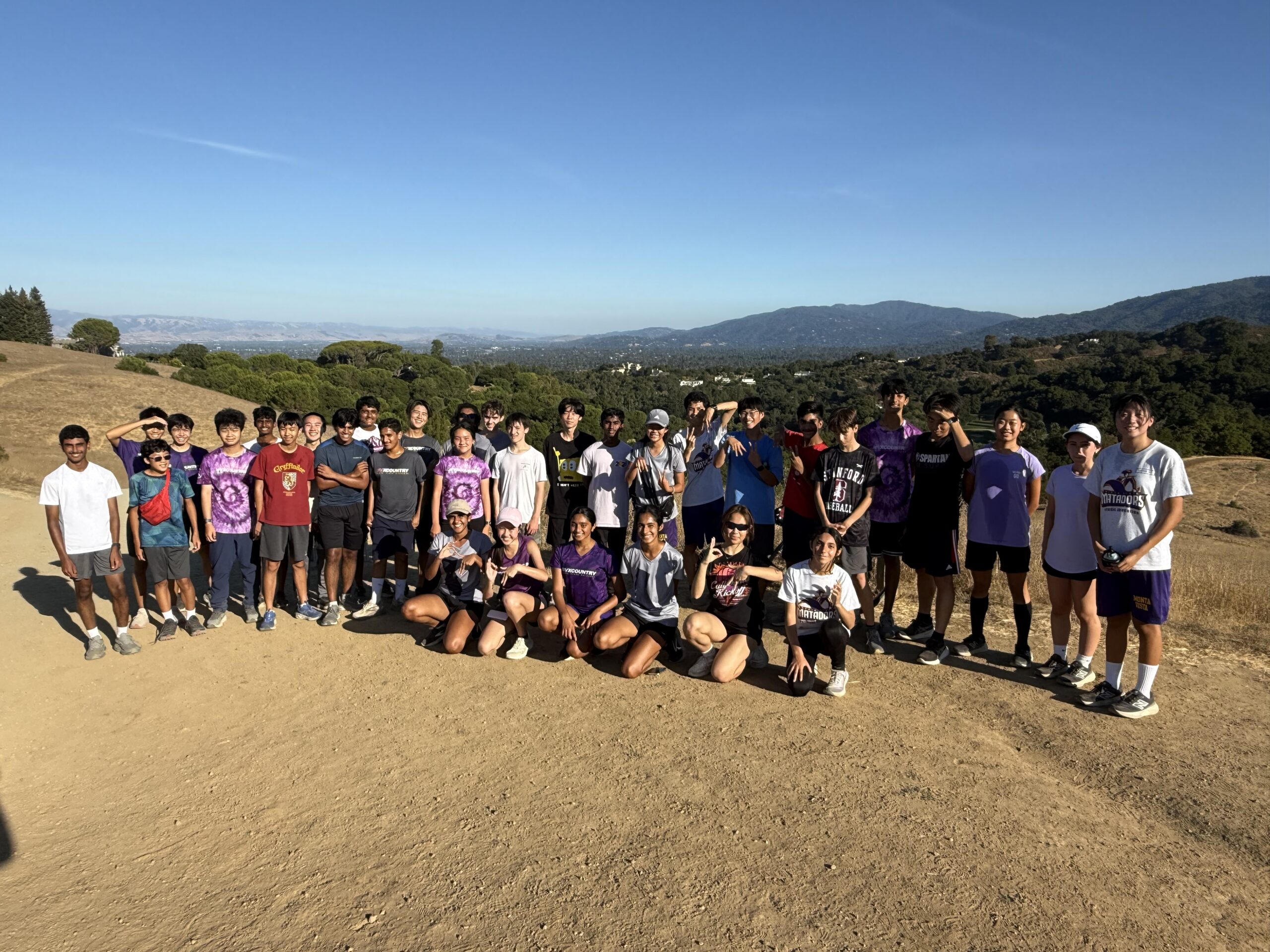 Team at the top of Up and Over